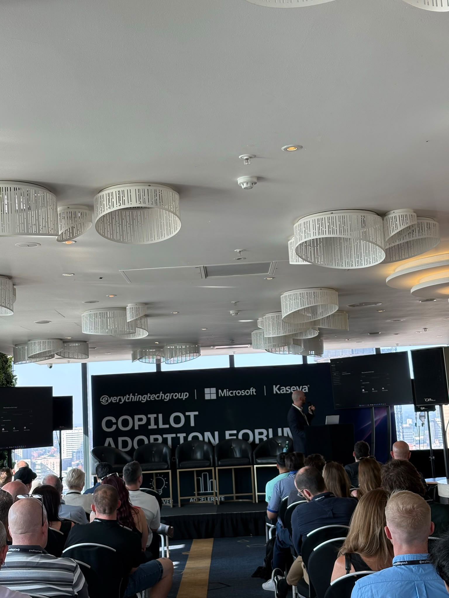 Anthony Hautin speaking on stage at the Copilot Adoption Forum, Cloud 23, Manchester